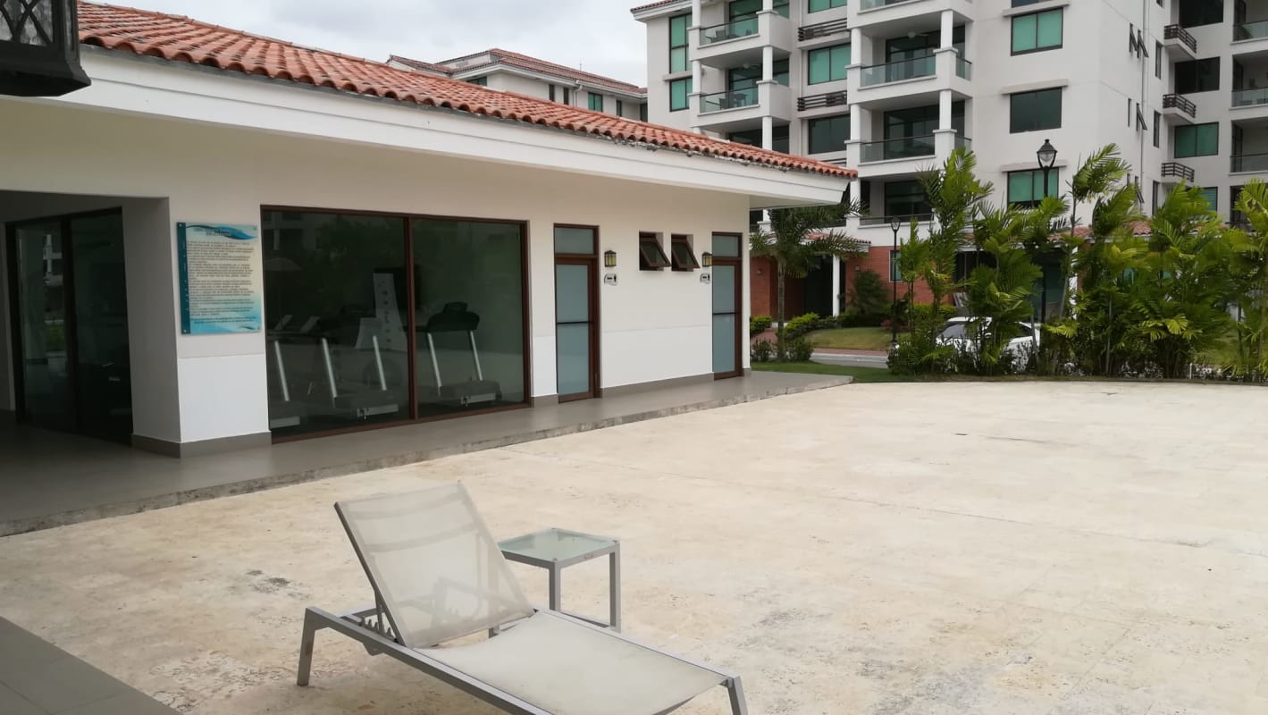Spacious modern kitchen with granite counters and sleek cabinetry in PH Costamare, Panama City