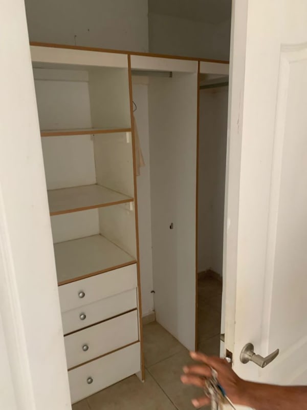 Bedroom with large windows tile floor built-in closet PH San Francisco Bay Panama