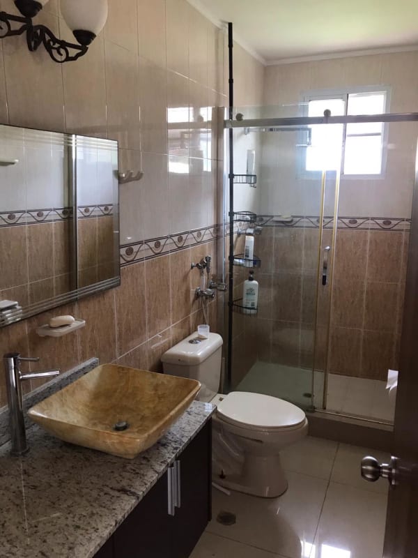 Small swimming pool with tropical garden in duplex house backyard El Doral Betania Panama