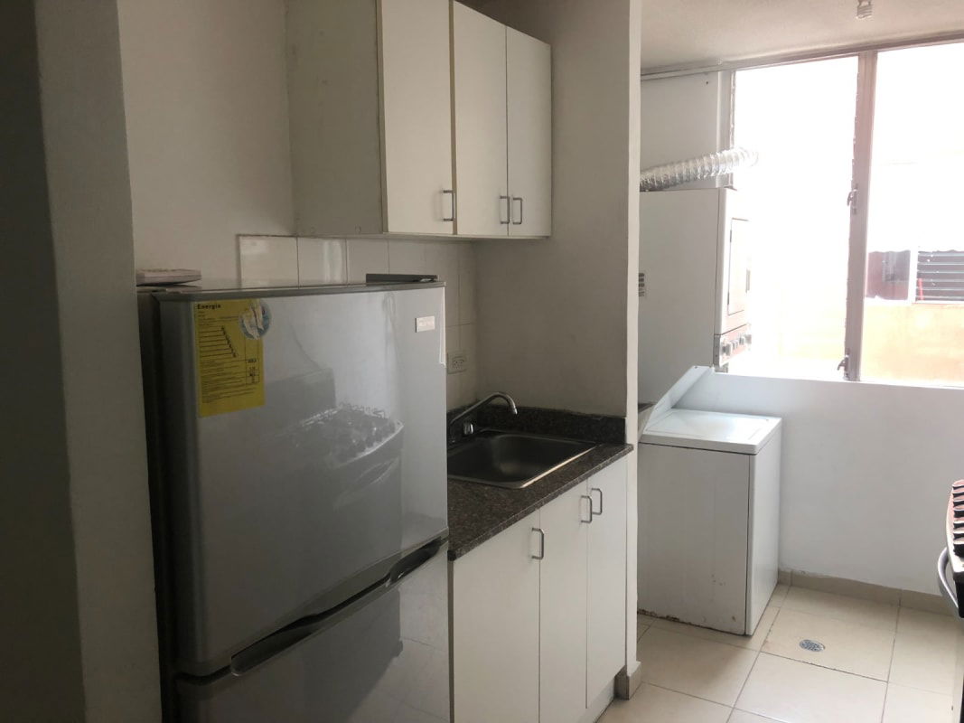 Modern kitchen featuring granite counters, cabinetry and appliances Mystic Village Don Bosco Panama City