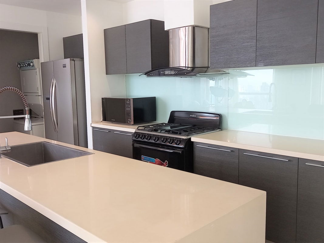 Luxurious shared game room with pool table, library shelves, designer lighting Yoo Panama Panama