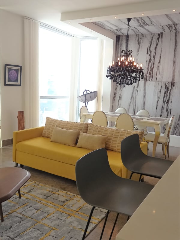 Wall-mounted toilet vessel sink glass shower modern fixtures luxury Yoo Panama bathroom