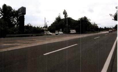Road edge of large fenced vacant lot with clear views beside Bijao Beach Resort area in Coclé Panama