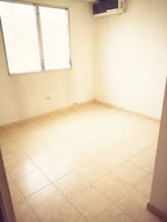Remodeled kitchen with cabinets and window in Arraiján Panama