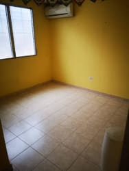 Bright bedroom with tile floors and window house for sale Vista Alegre Arraiján