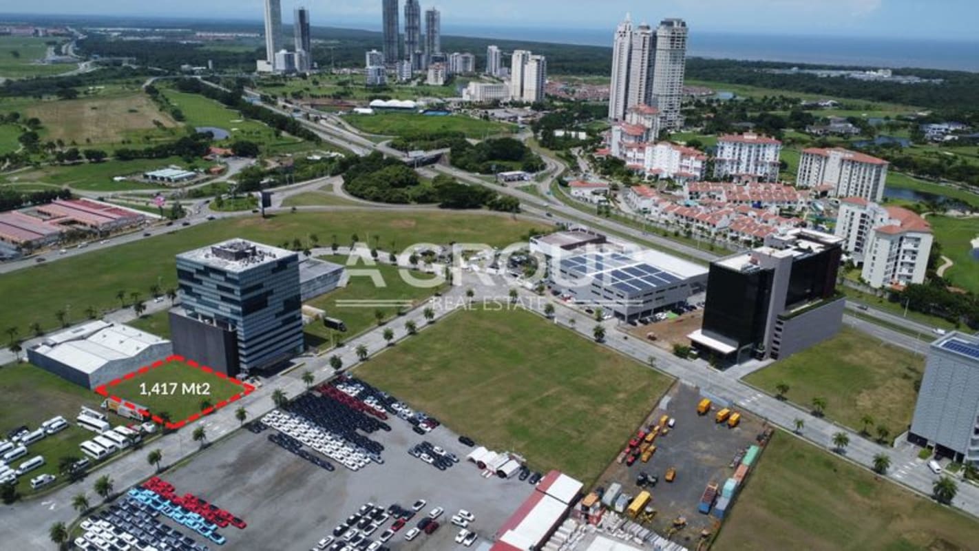 Empty development plot inside Santa María Business District with commercial buildings, high-rise towers and coastal skyline in Panama City