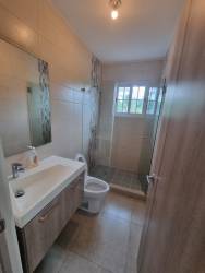 Expansive terrace with views of golf lagoon in Panama beachfront villa Quarry Heights Bijao