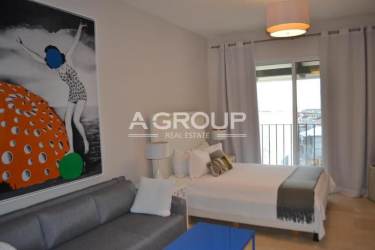 Lush gardens and pathway near swimming pools at Buenaventura Resort in Panama