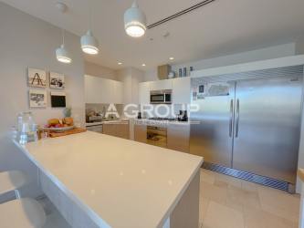 Open kitchen design with marble counters appliances Buenaventura Puntarena condo