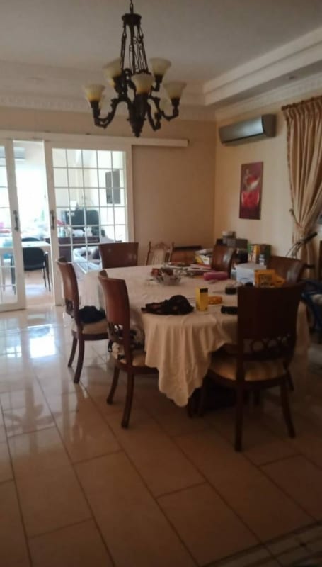 Entryway hallway with staircase and decorative ceiling in Royal Country Condado del Rey Panama