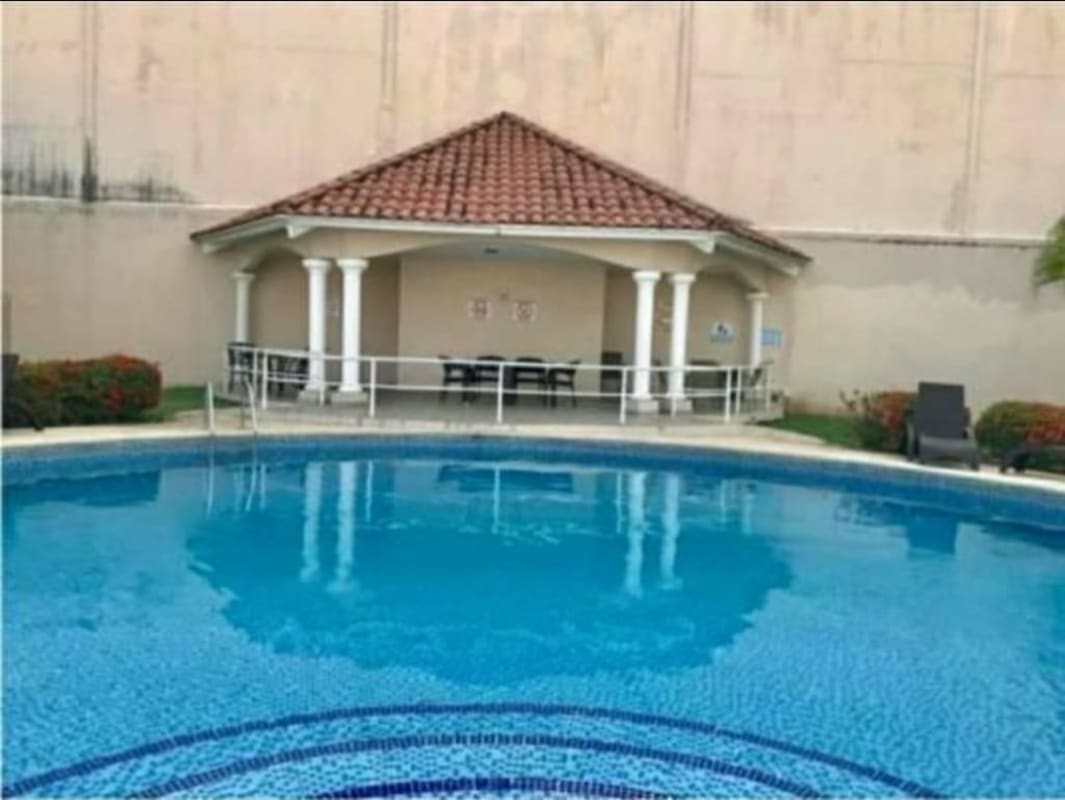 Private backyard garden with swimming pool at Royal Country Condado del Rey Panama City