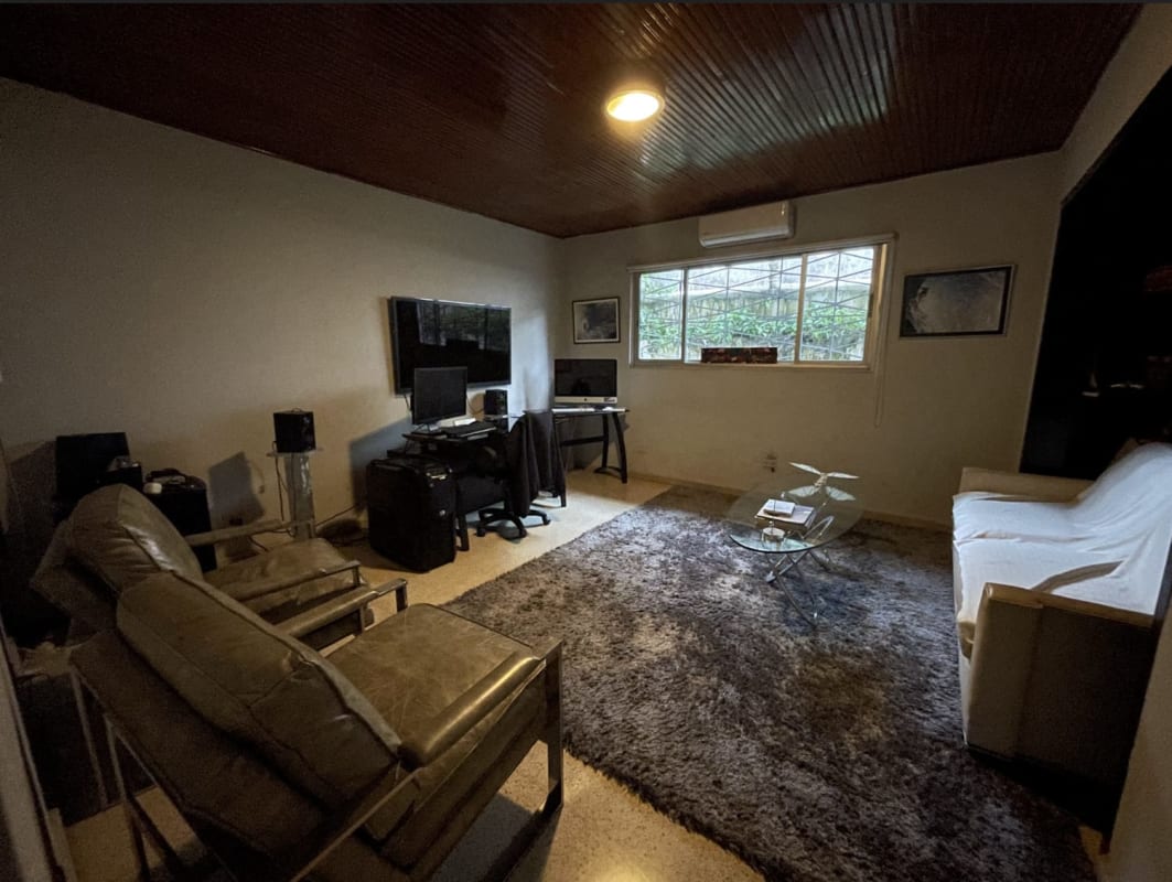 Covered terrace patio area with garden views at Coco Corporate Center Panama