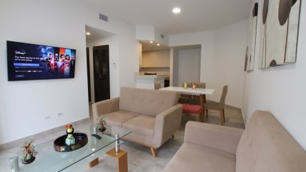 Spacious master bedroom furnished with ensuite and canal views in Panama Pacifico