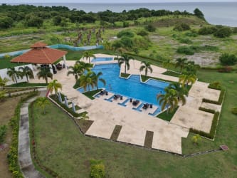 Aerial photo with swimming pools, garden and ocean Playa del Sol San Carlos Panama