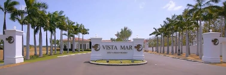 Resort-style infinity pool with ocean backdrop at Vista Mar Golf Beach Resort San Carlos