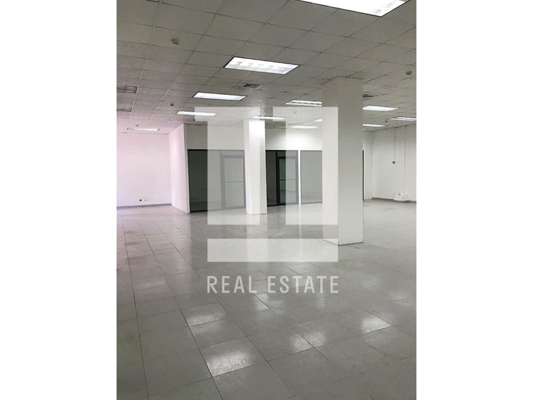 Empty open-plan tiled office space with suspended lighting Albrook Panama