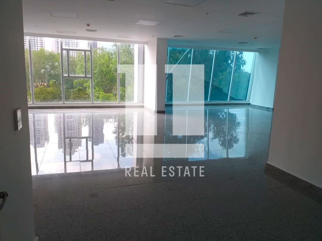 Wide office space with glass windows overlooking Costa del Este skyline for rent