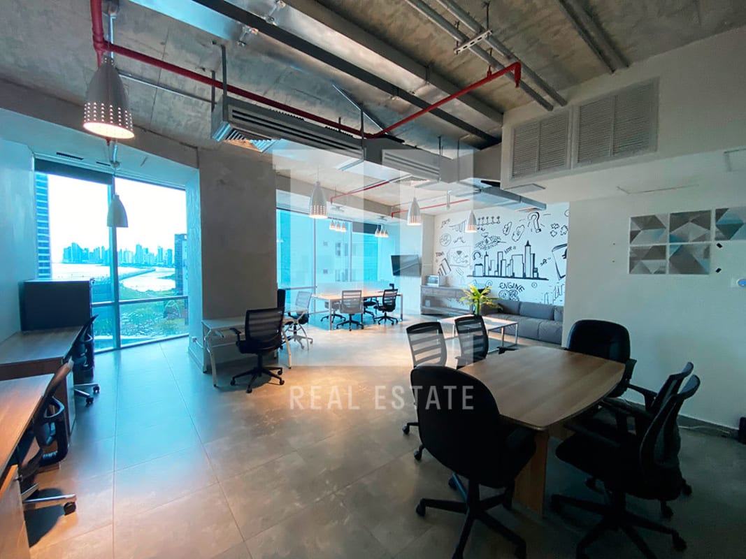 Open office with floor-to-ceiling windows, city view, modern fixtures in PH Financial Park Costa del Este Panama City