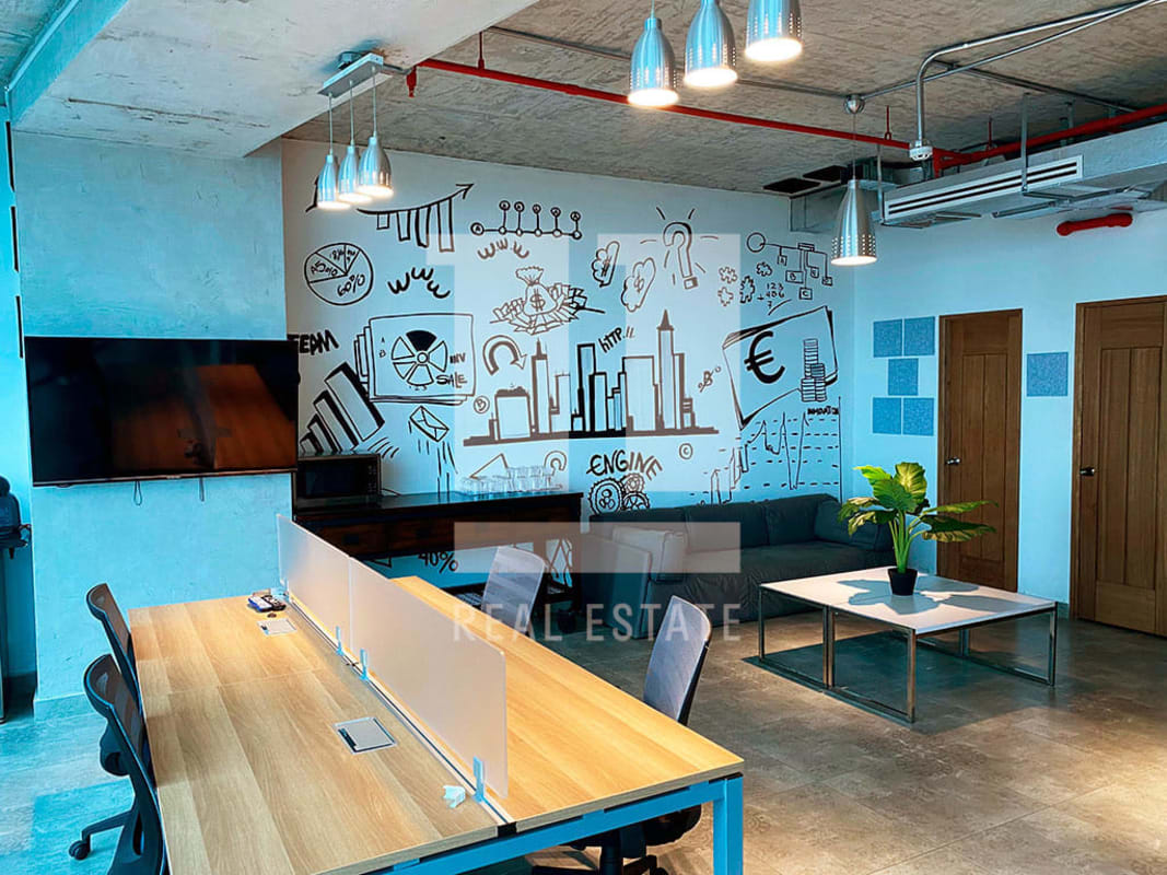 Modern industrial office design with creative wall art, open desks PH Financial Park Costa del Este Panama