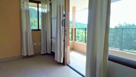 Spacious master bedroom ground floor walk-in closet ensuite bath mountain view Panama