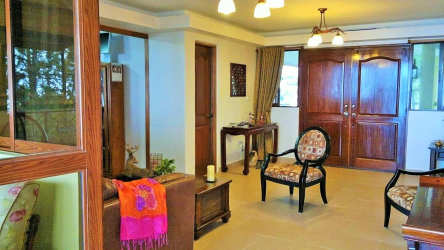 Outdoor covered terrace surrounded by greenery in mountain home Piamonte Altos del María Panama