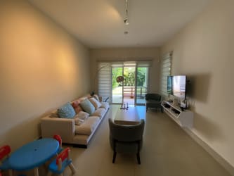 Spacious covered terrace with seating at Casamar duplex golf resort Panama