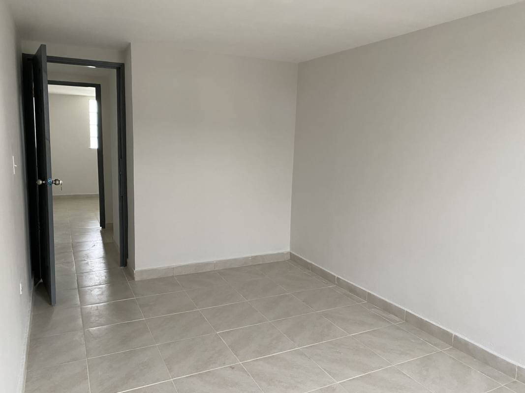 Unfurnished bedroom with tile flooring window natural light in Altos de San Angel Panama