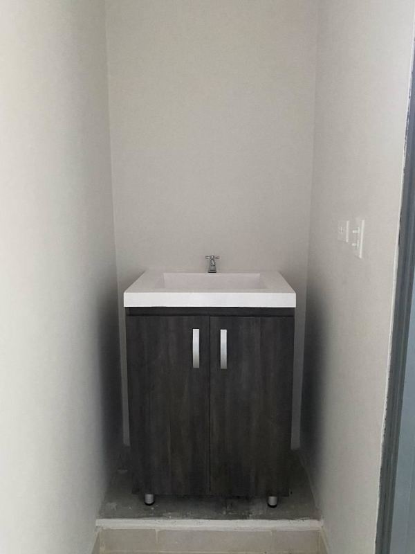 Narrow bathroom with modern vanity single sink rental house Altos de San Angel Panama