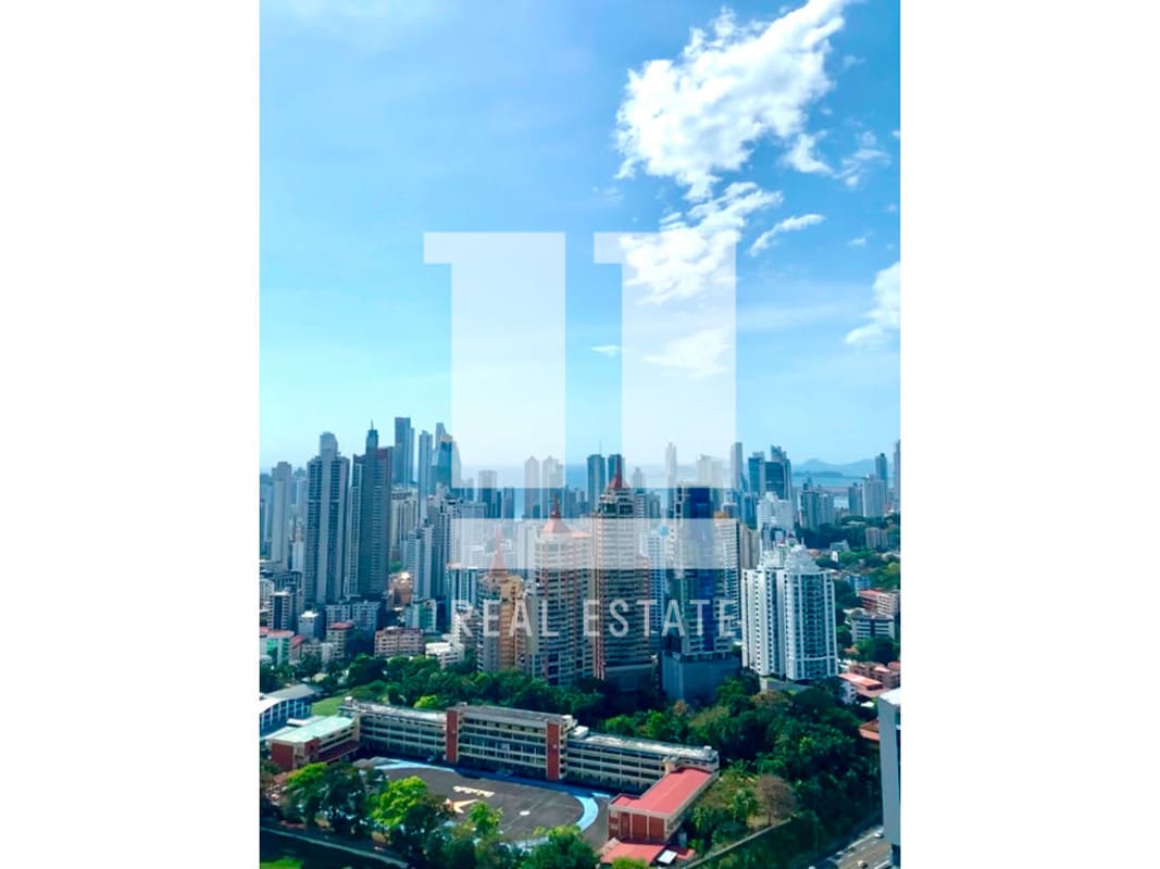 Modern kitchen with granite countertops, stainless appliances, backsplash tiles in PH Vivendi Green Panama