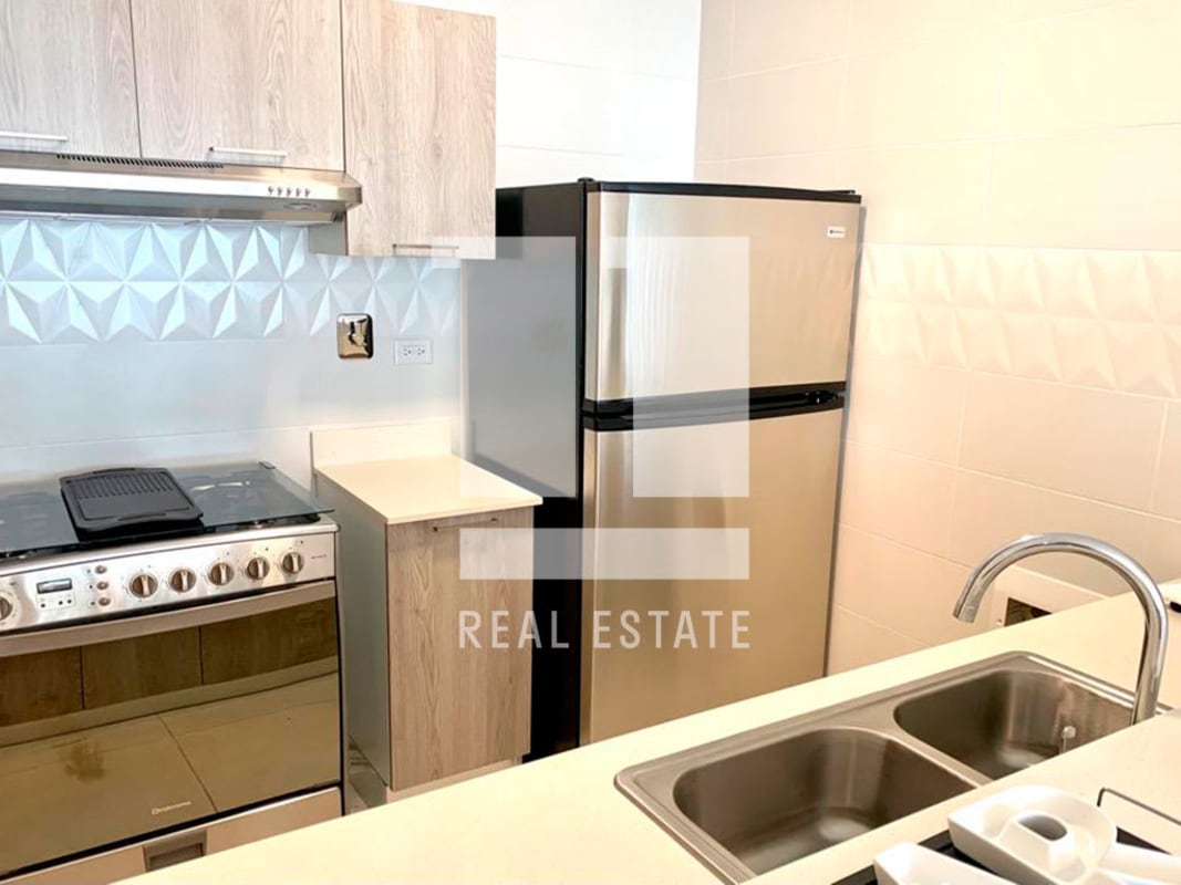 Kitchen with granite countertop and modern cabinetry PH Vivendi Green Panama