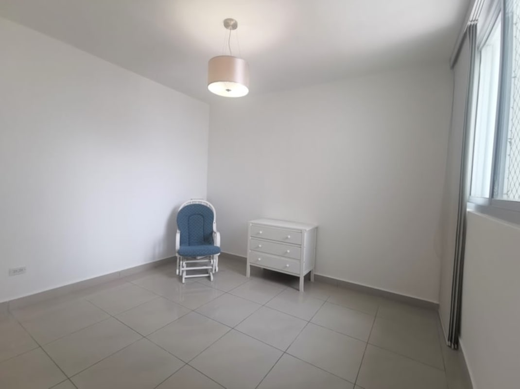 Bright bedroom with large window city skyline PH The Regent San Francisco