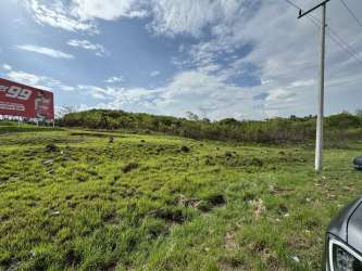 Flat commercial-use land by highway ideal for project development Aguadulce Panama