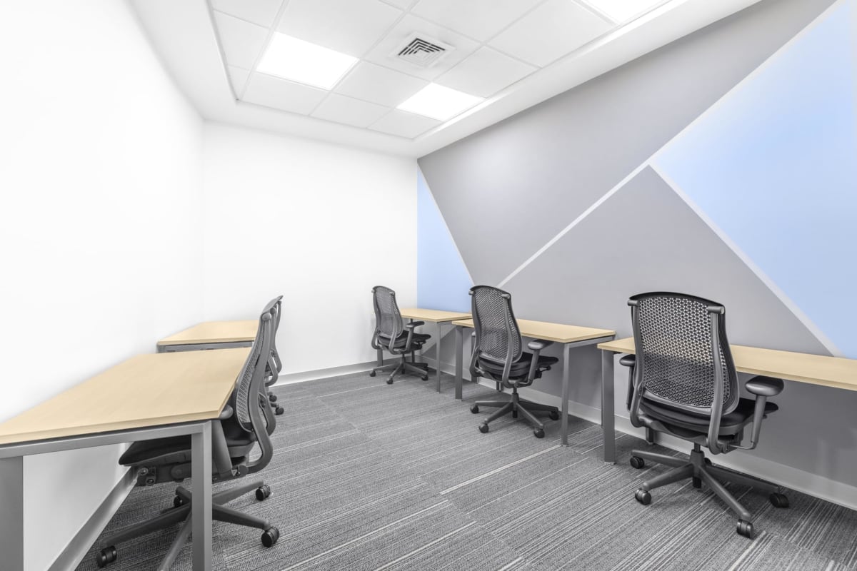 Modern office break room with kitchenette and dining area at Financial Park Costa del Este Panama City