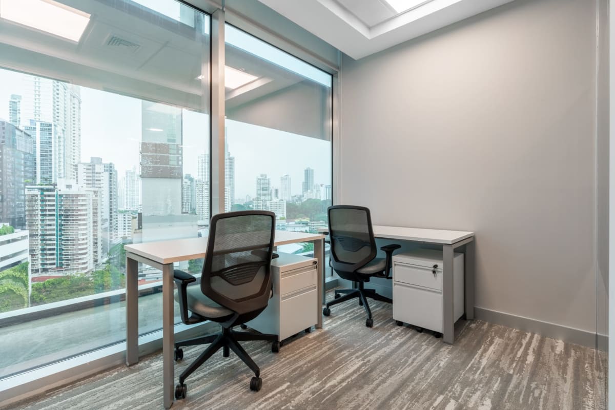 Minimalist private office for one person with ergonomic furniture at Banistmo Tower Panama City