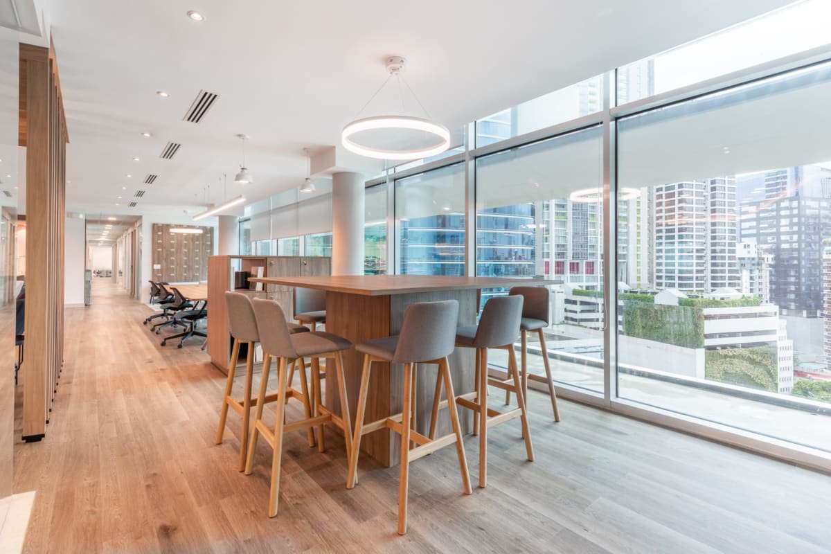 Glass-enclosed meeting room with contemporary furnishings in Banistmo Tower Panama