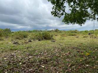 Open grassy farm field in countryside setting of Chiriquí Boquerón Panama