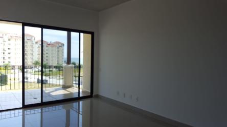 Scenic golf course with sand bunkers and palm trees at Vista Mar Panama