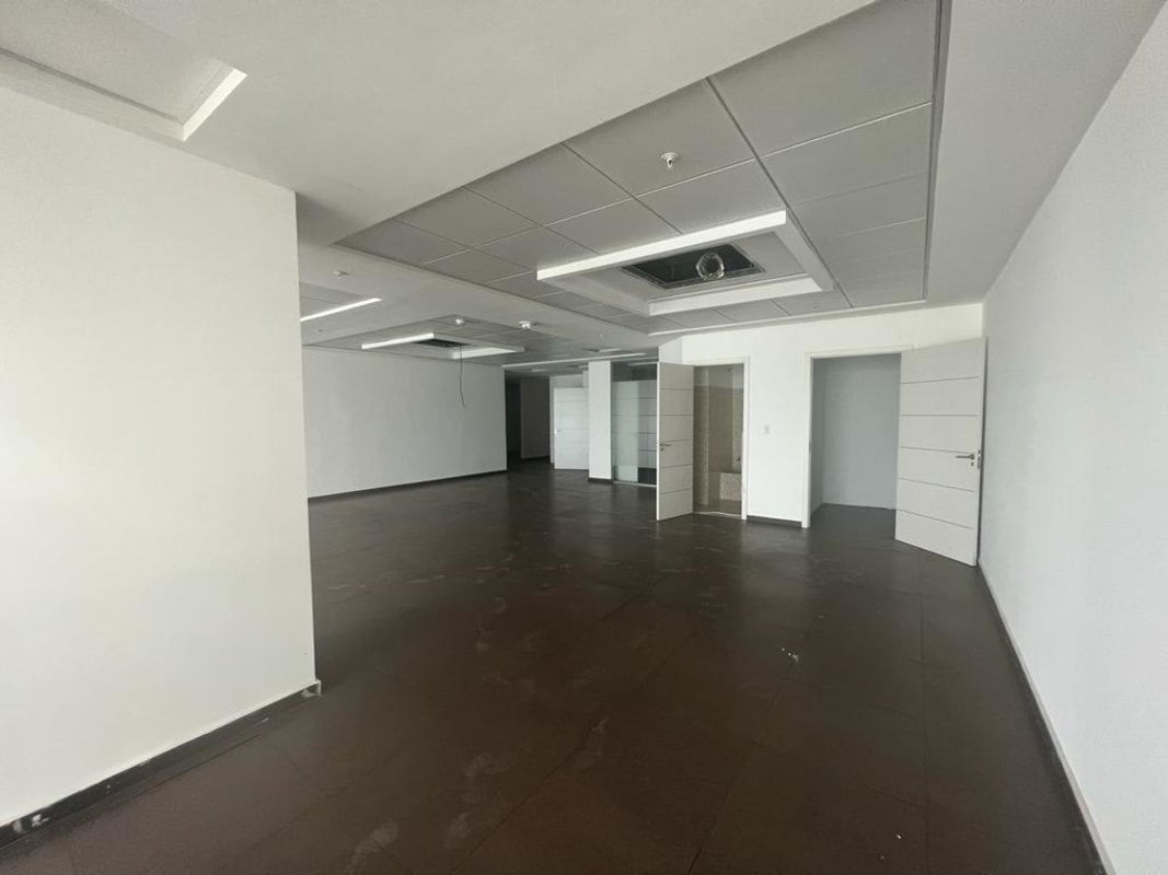 Reception desk and lobby entrance in PH Balboa Office Center modern tower Panama City