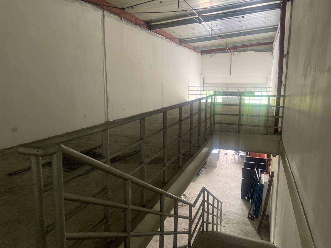 Interior mezzanine warehouse with exposed beams commercial property Obarrio Panama