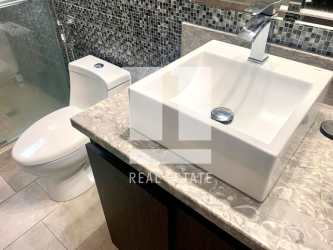 Bathroom with vessel sink granite glass shower mosaic tile PH Forest Tower Tucan Panama