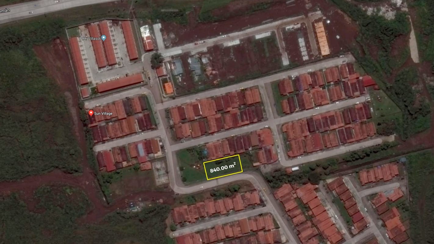 Neighborhood aerial highlighting spacious corner lot for commercial or mixed-use development in El Crisol Panama City.