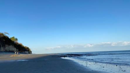 Parking and lit exterior villas at night PH Riomar beach complex Panama