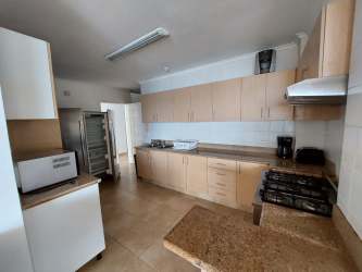 Modern kitchen with appliances granite countertops Playa Blanca Farallon Panama