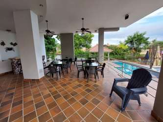 Covered balcony with ceiling fans overlooking Pacific Ocean Playa Blanca Resort