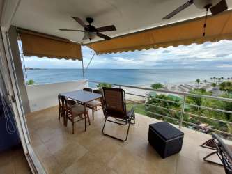 Balcony with sea view and outdoor seating Playa Blanca Resort Farallon Panama rental