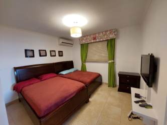 Guest bedroom with AC and tile floors Playa Blanca Resort Panama rental