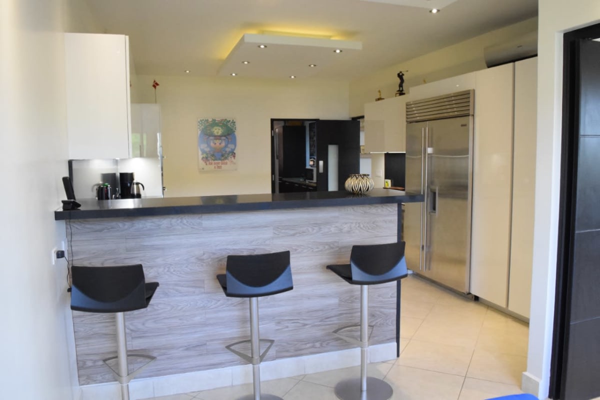 Luxurious bathroom with marble counters and bathtub PH Embassy Club Clayton Panama