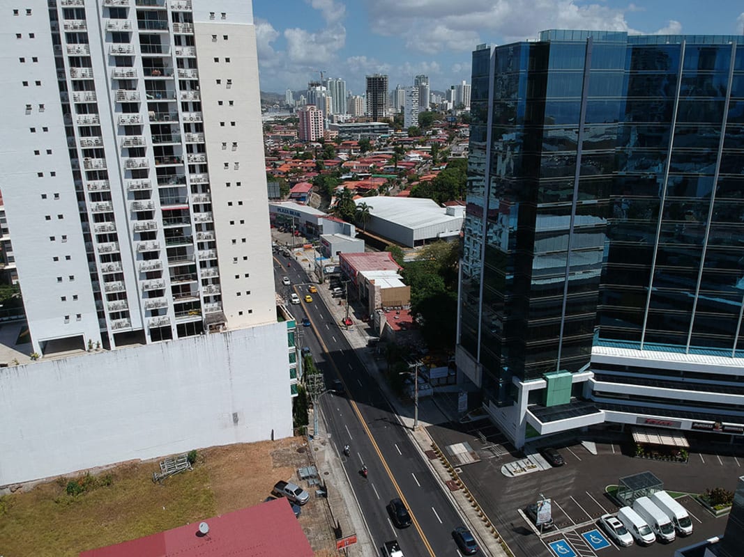 Modern office and residential towers surrounding vacant development lot Obarrio Panama