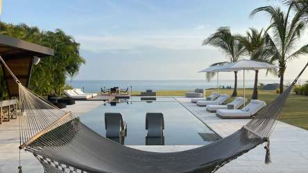 Terrace with panoramic ocean view infinity pool hammock lounge Casamar Panama luxury villa