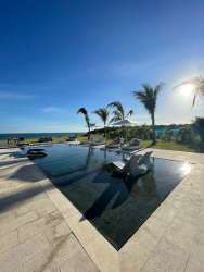 Luxury infinity pool with sun loungers overlooking Pacific Ocean Casamar San Carlos Panama